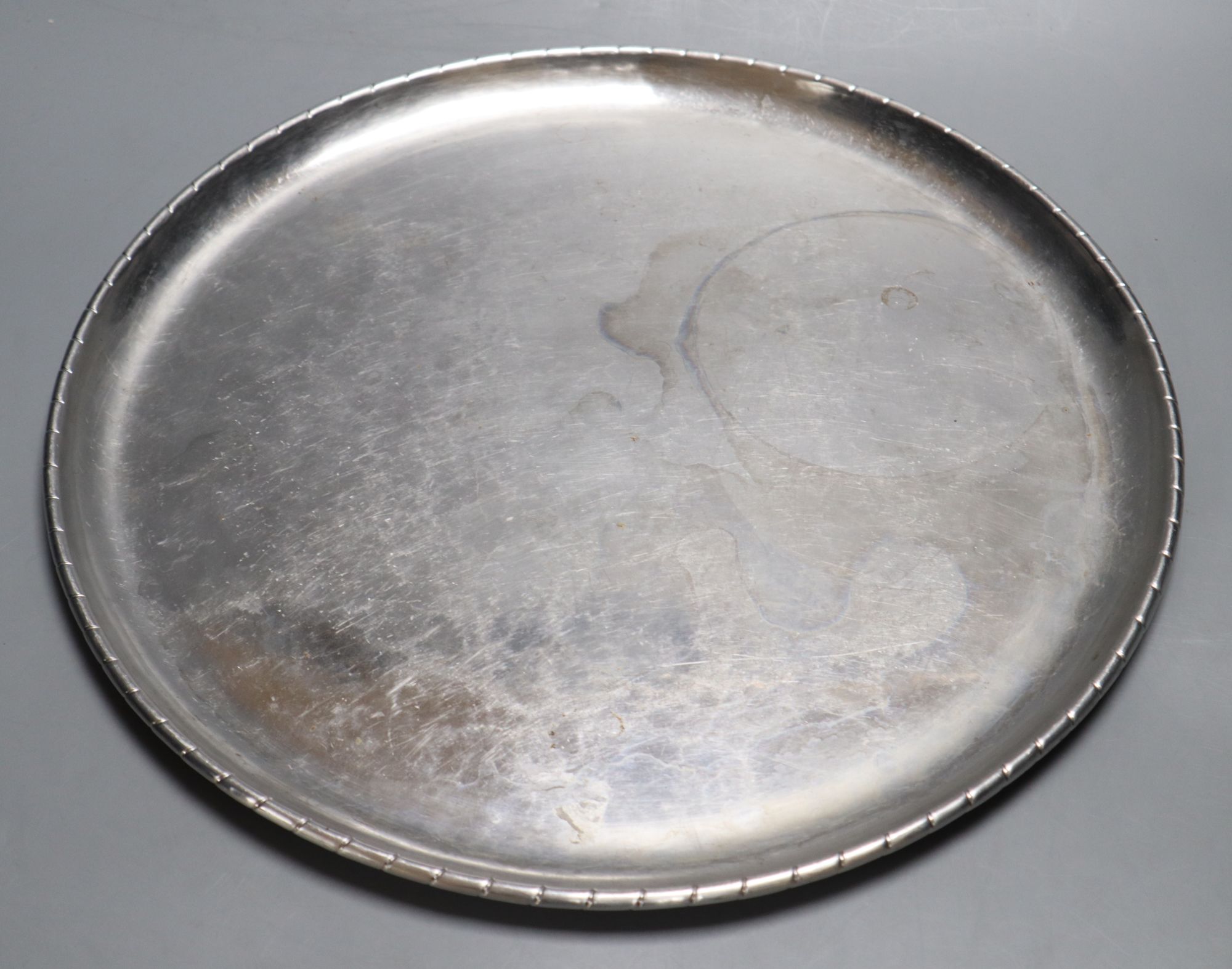 A Keswick School of Industrial Arts planished pewter tray, diameter 38cm